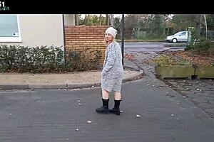 Amateur milf flashes natural tits outdoors stripping