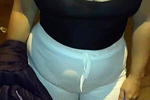 Madura flashes red thong in see-through leggings on street