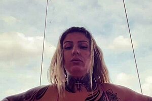tattooed chick's hard nipples pop through see-through gym top