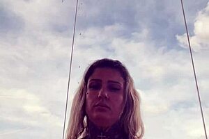 tattooed chick's hard nipples pop through see-through gym top