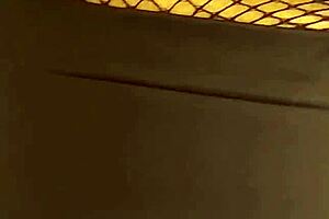 Latina milf wife flaunts huge natural tetona tits in fishnets