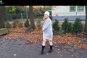 Amateur milf flashes natural tits outdoors stripping