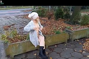 Amateur milf flashes natural tits outdoors stripping