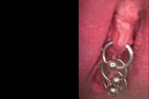 close up on shaved pussy lips pierced clit squirting wet in public toilet outdoors