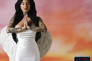 busty tattooed milf joanna angel strips luscious body for playboy