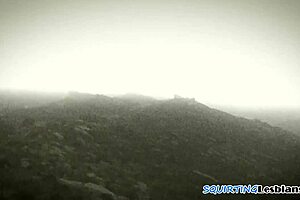 Inked beauty squirts hard fingered by hot milf babe