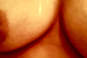 cumming hard in the shower again with my big dildo bouncing off my titties