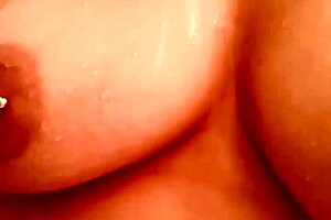 cumming hard in the shower again with my big dildo bouncing off my titties