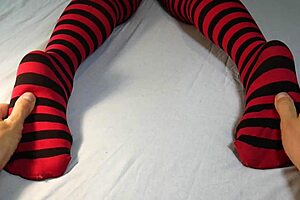 guy massages and tickles her bare soles after stripping off those sexy socks