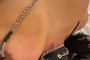 he squeezes n stretches my dark hard nipples in bondage