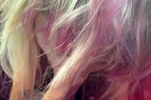 pretty girl kneels in car backseat for a deep oral session outdoors