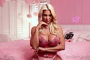 brittany andrews in pink lingerie toys her juicy big tits pussy