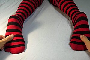 guy massages and tickles her bare soles after stripping off those sexy socks