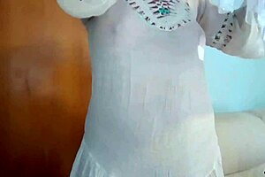 Madrasta flashes see-through dress no panties while cleaning house