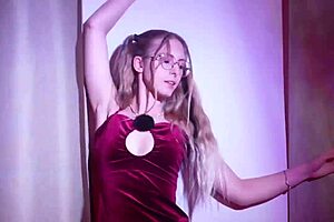 she dances teasing her bare pussy lips waiting for the perfect flash