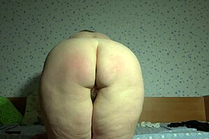 Busty Russian MILF with fat belly and hairy juicy pussy tries thongs on webcam shaking big tits