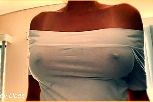 Wife teases voyeurs by flashing her amazing braless tits through wet shirt.