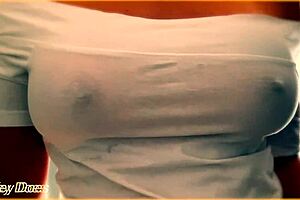 Wife teases voyeurs by flashing her amazing braless tits through wet shirt.