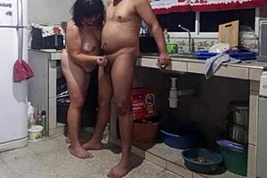 suegra jerks me off in kitchen begging doggy creampie!