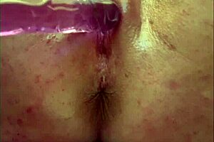 She masturbates anally while moving grapes inside