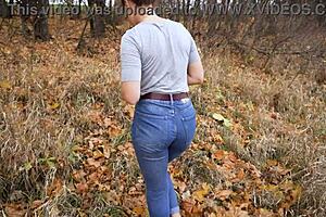 milf teases huge ass in tight jeans outside