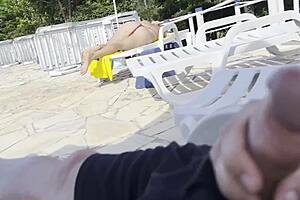 i was jerking off by the pool when this big tit milf helped me explode cumshot