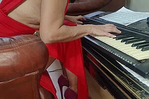 stepson sneaks up and fucks stepmom right in the middle of her piano lesson doggystyle