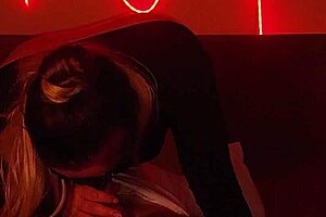 blonde milf sucks cock then rides it hard under red lights