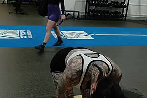 Gym milf's juicy booty shakes during intense workout session drawing all eyes