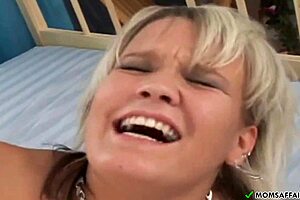 Chubby blonde milf mommy flaunts big natural tits. Sexy mature bbw poses softcore backstage.