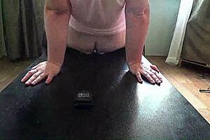 Chubby milf shows off saggy big boobs backstage with dildo