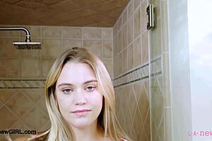 The elegant blonde model relaxes in a sensual bath during her classy photoshoot interview