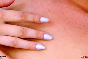 captivating blonde model strips down showing off her sexy petite body on sofa