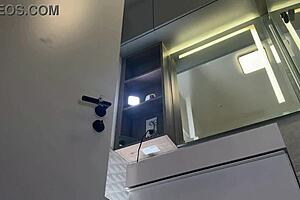 hottest redhead milf wife teases in shortest skirt fishnets in bathroom, wanna see?