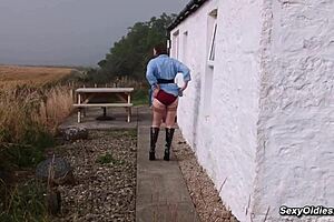 Huge tits granny Allison rubs pussy outdoors on desk toy play.