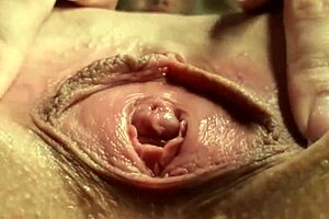 neighbor spreads her wet pussy wide in close-up view