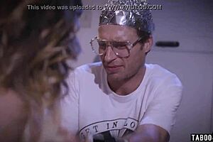 Busty astronaut drilled then straps nerd guy