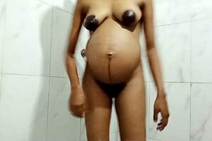 pregnant stepmom bathes while stepson watches and films her curves