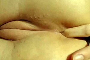 Camgirl's Teasing Anal Play Hints at Intense Orgasm