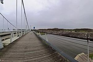 exposing my huge natural saggy tits on the bridge outdoors