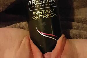 YOUNG SLUT rams 6-inch round hairspray can into GAPING WET PUSSY
