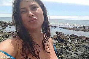 curvy brunette dresses sexy for beach photoshoot then fingers pussy voyeur style