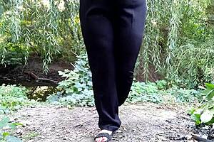 Stepmom pisses outdoors to excite stepson with her big fat ass?