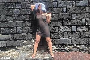 curvy brunette dresses sexy for beach photoshoot then fingers pussy voyeur style