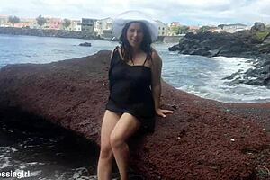 curvy brunette dresses sexy for beach photoshoot then fingers pussy voyeur style