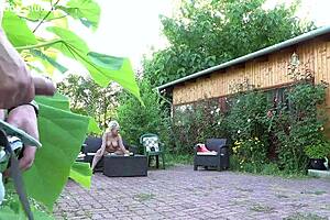 Busty chubby mature milf pumps huge cock outdoors in garden