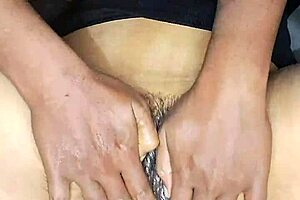 hot indian bhabhi's hairy pussy gets oiled up deep