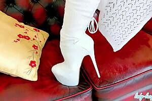 ever wonder how lady lucy teases in white thigh boots on that leather sofa?
