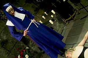 naughty nun angel long dominates katie k's ass with deep anal fingering