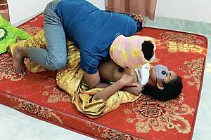 Desi bhabhi in saree moans romantically as hubby fucks kitchen style.